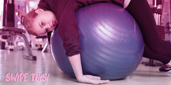 woman laying on workout ball with blank expression