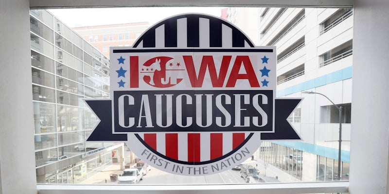 sign for the Iowa caucuses in window