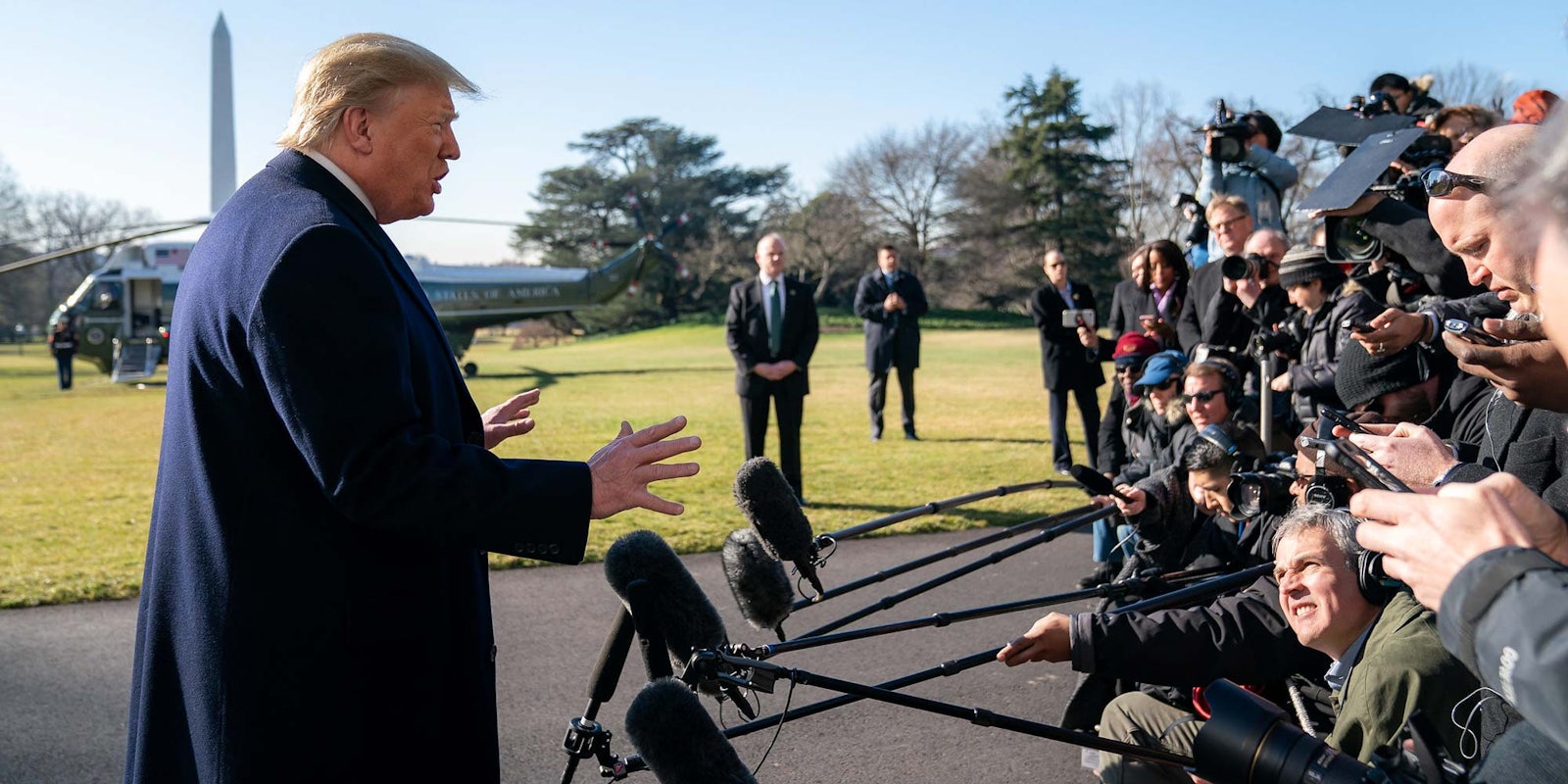 President Donald Trump and reporters outside the White House