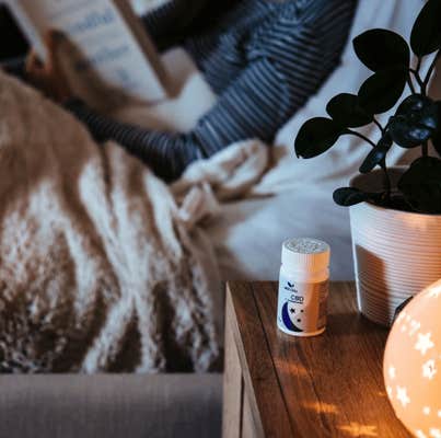 Bottle of MEdterra CBD oil on a nightstand