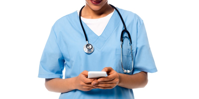 nurse holding smartphone