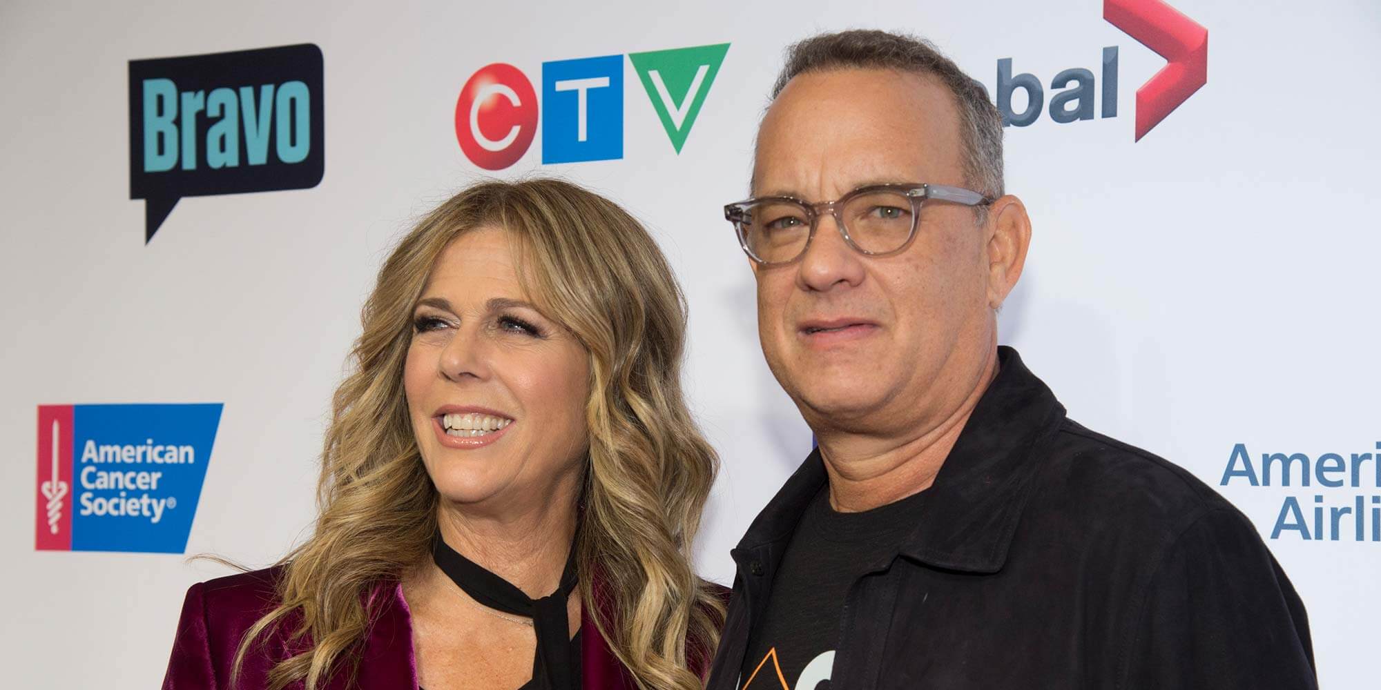 Rita Wilson and Tom Hanks on a red carpet