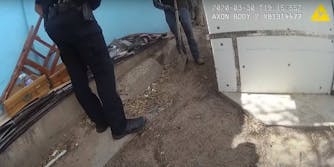 Bodycam footage shows officer Sandoval in conversation with Valente Acosta-Bustillos, who is holding a shovel