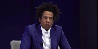 Rapper Jay-Z in a blue suit
