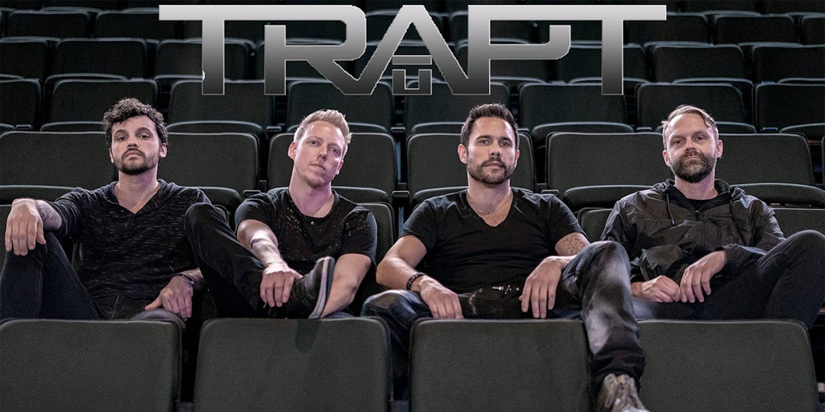 trapt promotional poster, sitting in empty theater