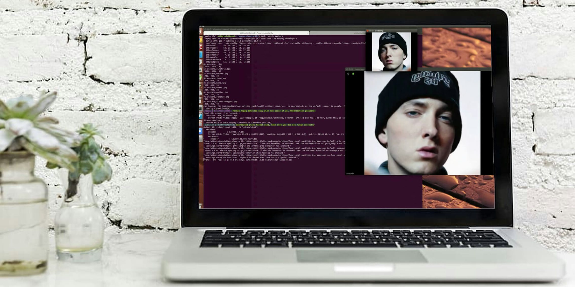 A Macbook with Eminem on the screen