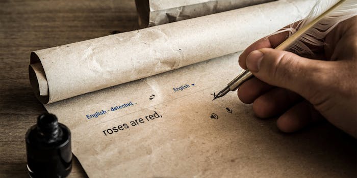 hand writing "roses are red" in google translate box with quill on parchment paper