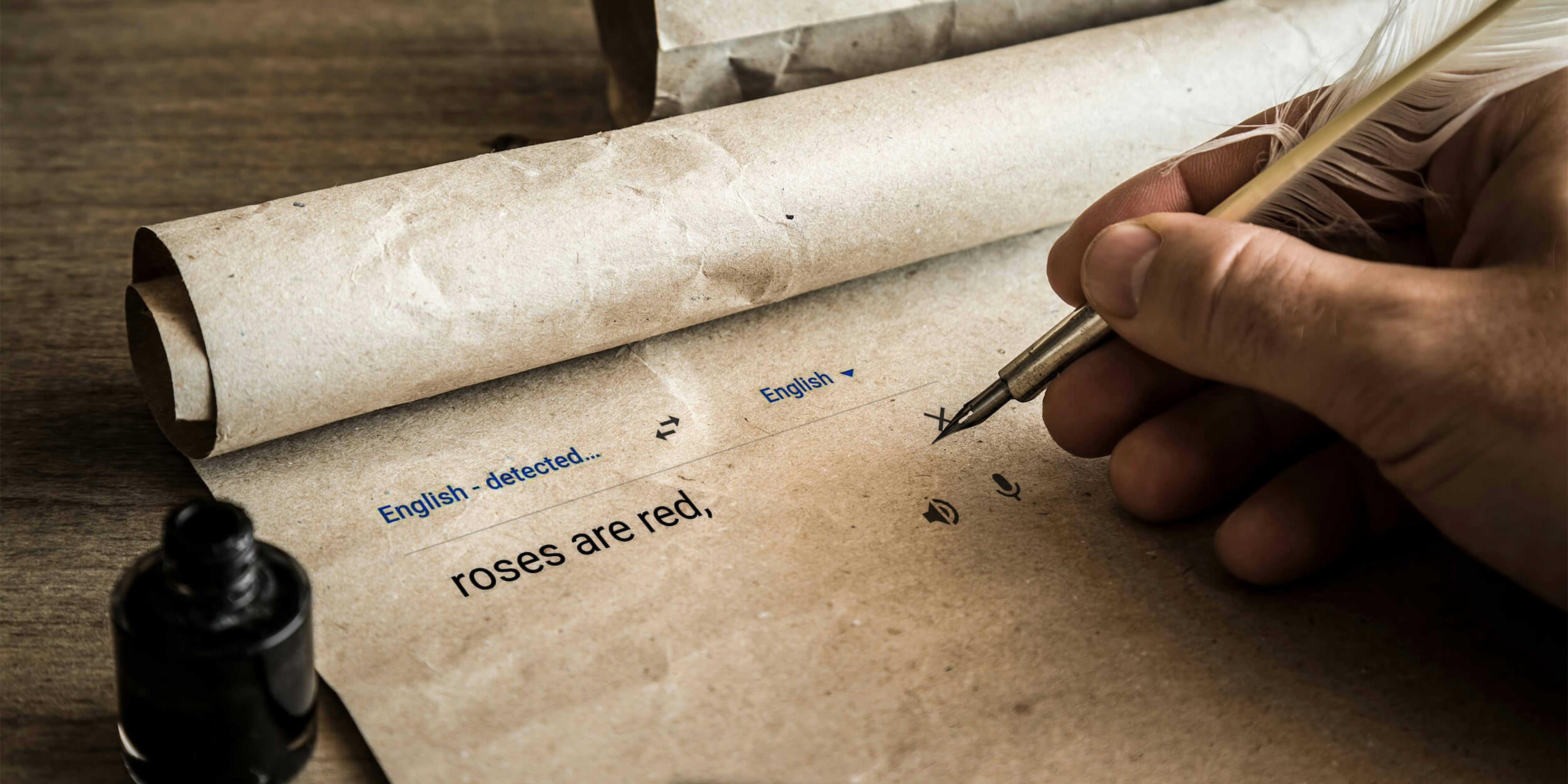 hand writing 'roses are red' in google translate box with quill on parchment paper