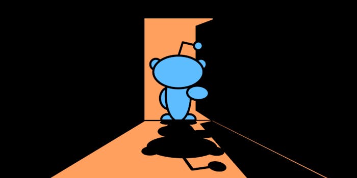 Reddit mascot standing in doorway