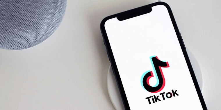 A phone with TikTok on the screen