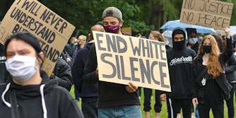 BLM protest sign of white silence