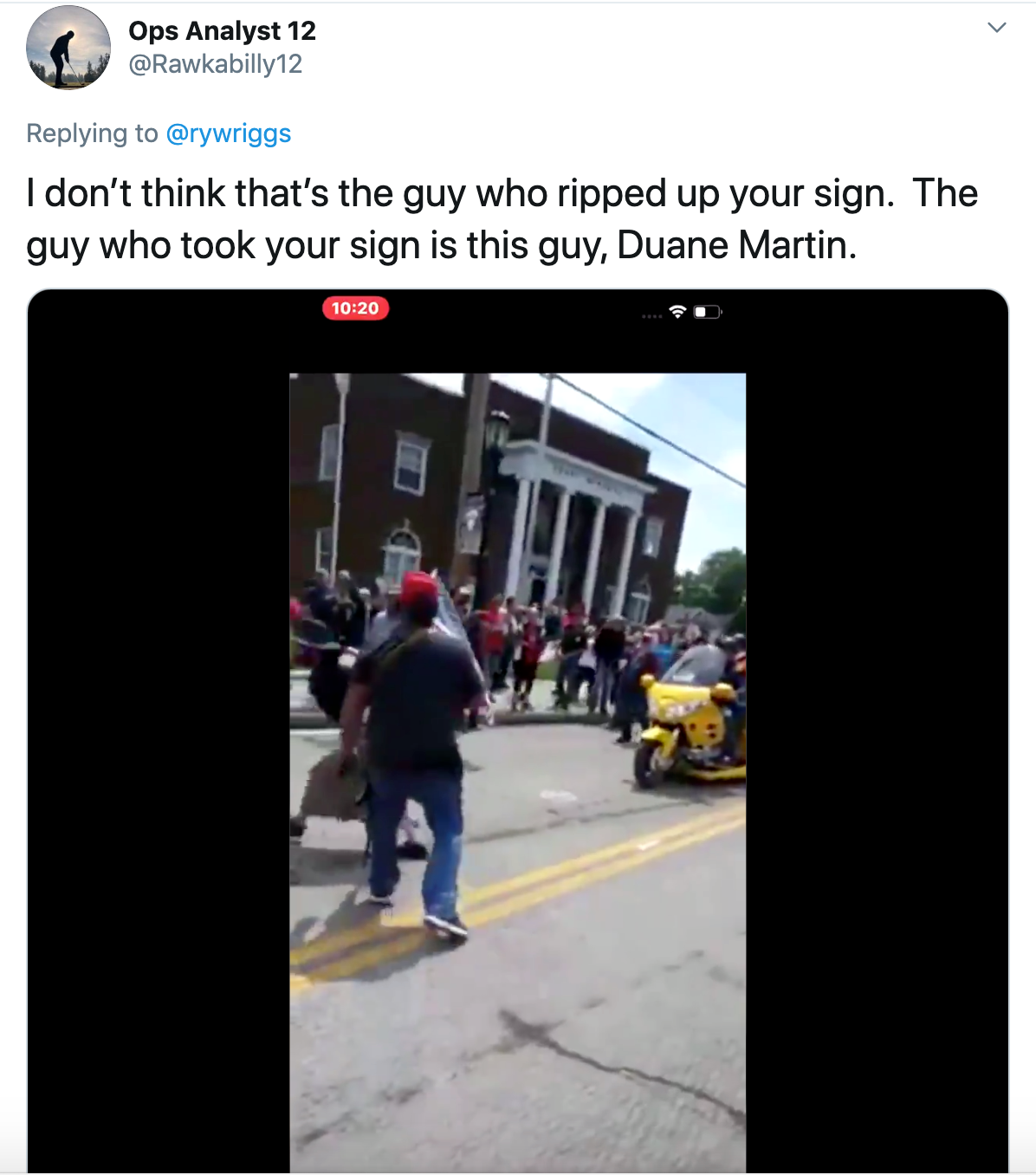 "I don’t think that’s the guy who ripped up your sign. The guy who took your sign is this guy, Duane Martin." followed by an image of a man with a gun lunging at a protester