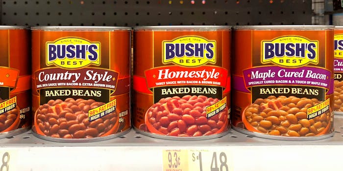 cans of baked beans on store shelf
