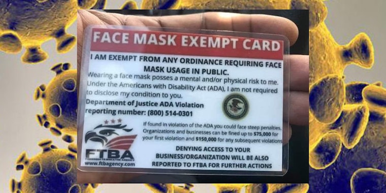 A face mask exempt card over the coronavirus