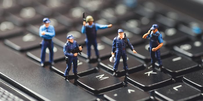 small police figurines on keyboard