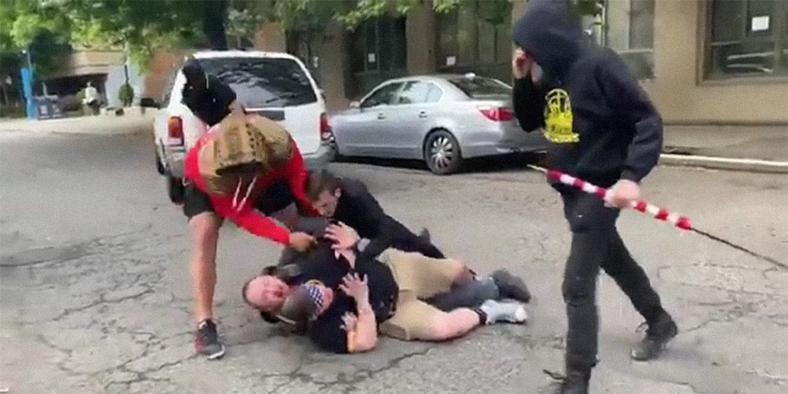 four 'Proud Boys' attack a man in the street