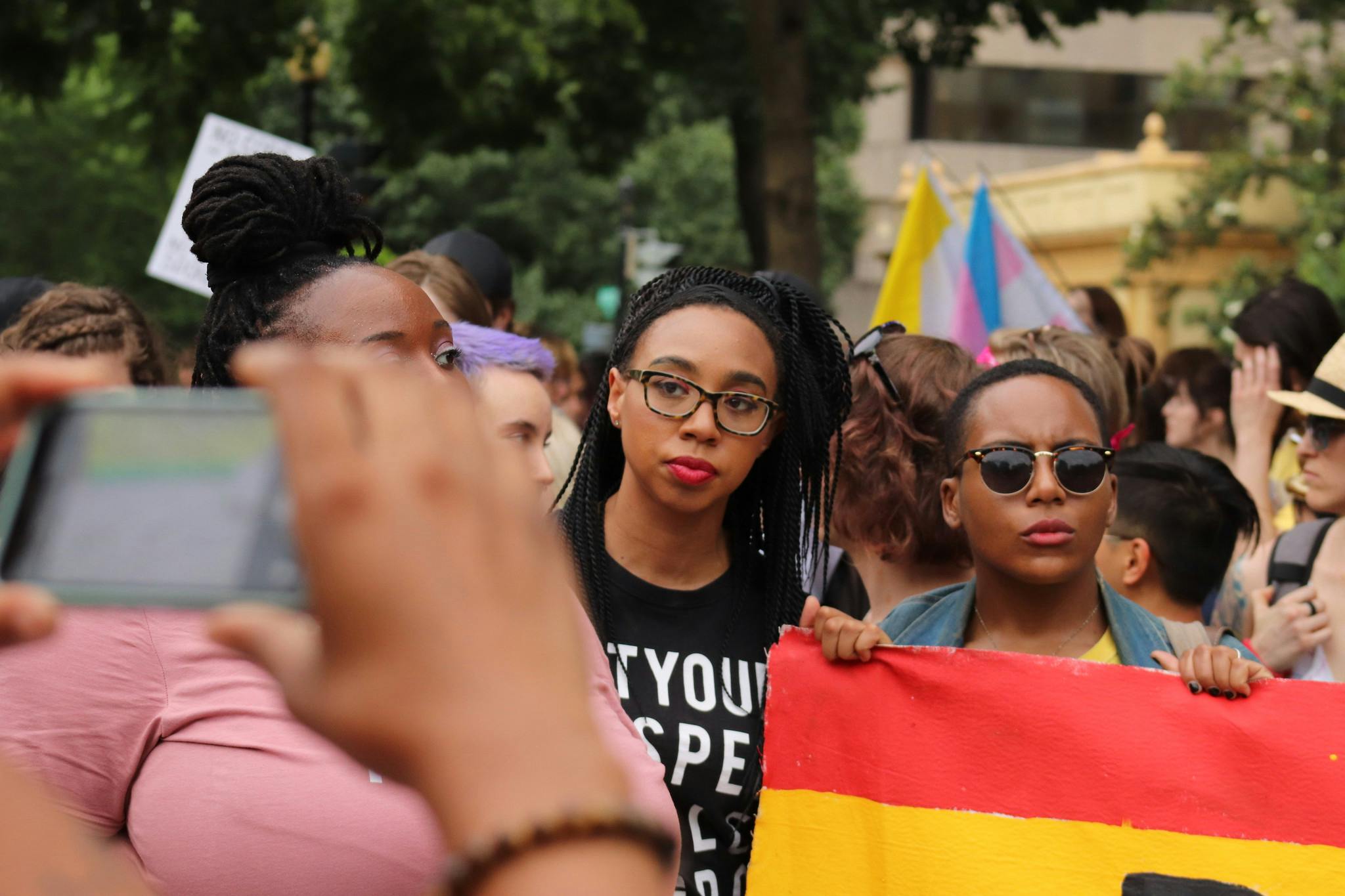 A group of Black queer people marching during an LGBTQ event. Public sex is an important part of the queer community's legacy.