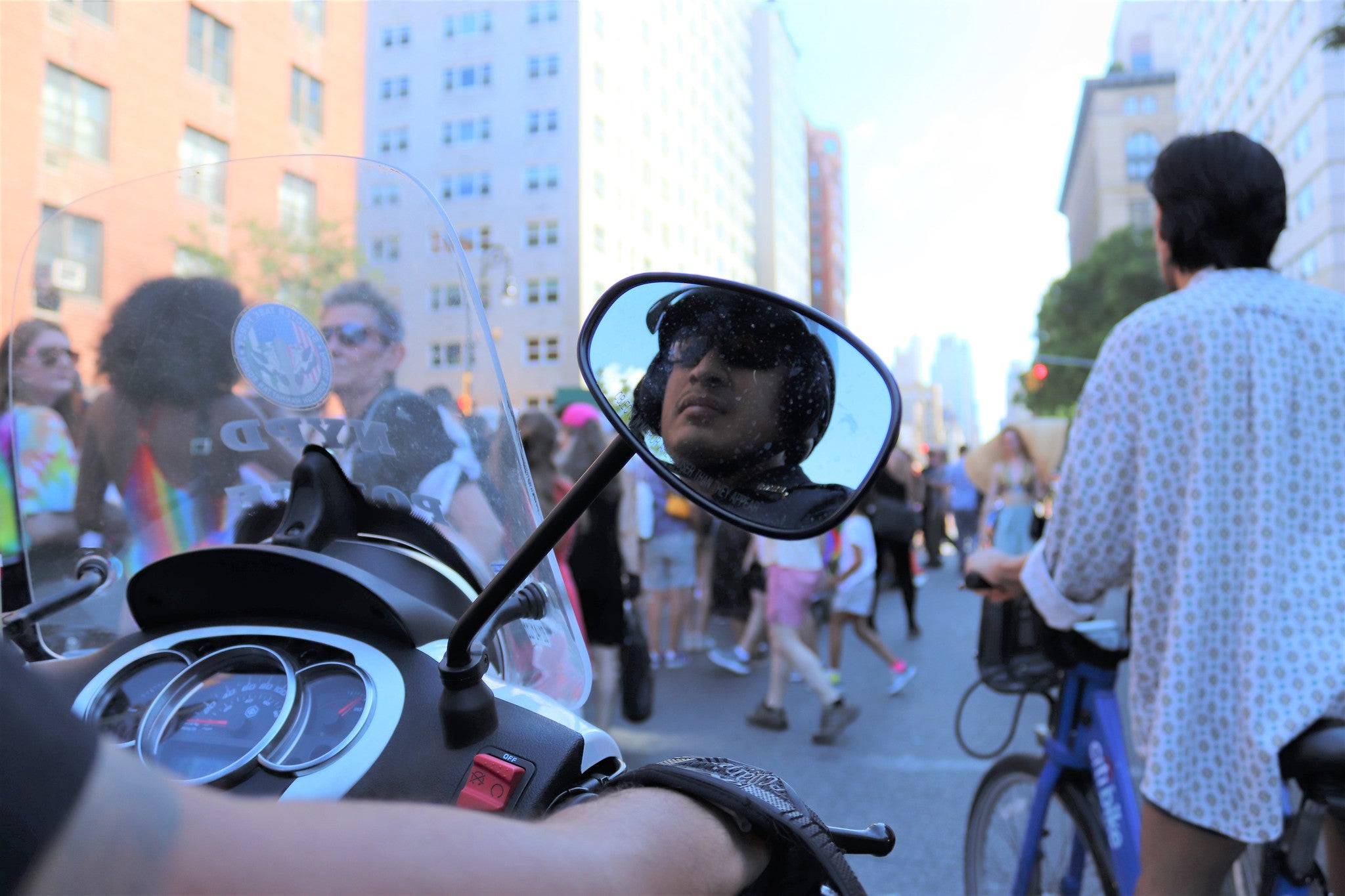 A close-up of an NYPD officer during an LGBTQ march.