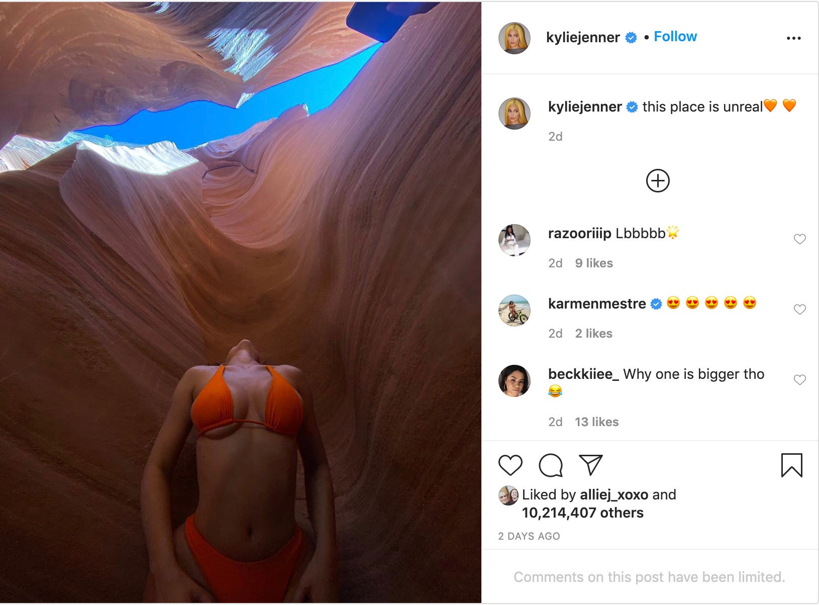 'This place is unreal' with a photo of Jenner in a bikini looking up at the opening of the canyon