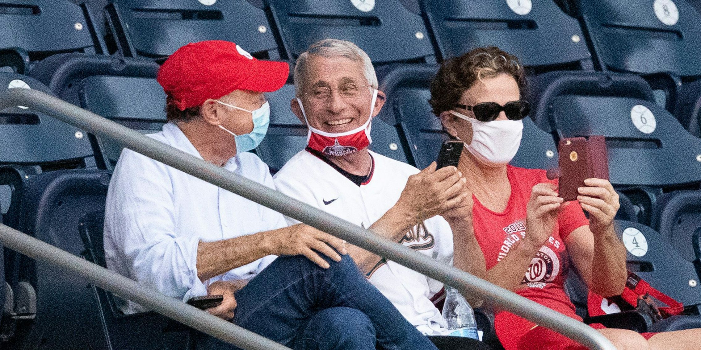 Fauci with mask down at Nationals game