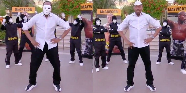 Stephen A. Smith dancing and wearing a white face mask