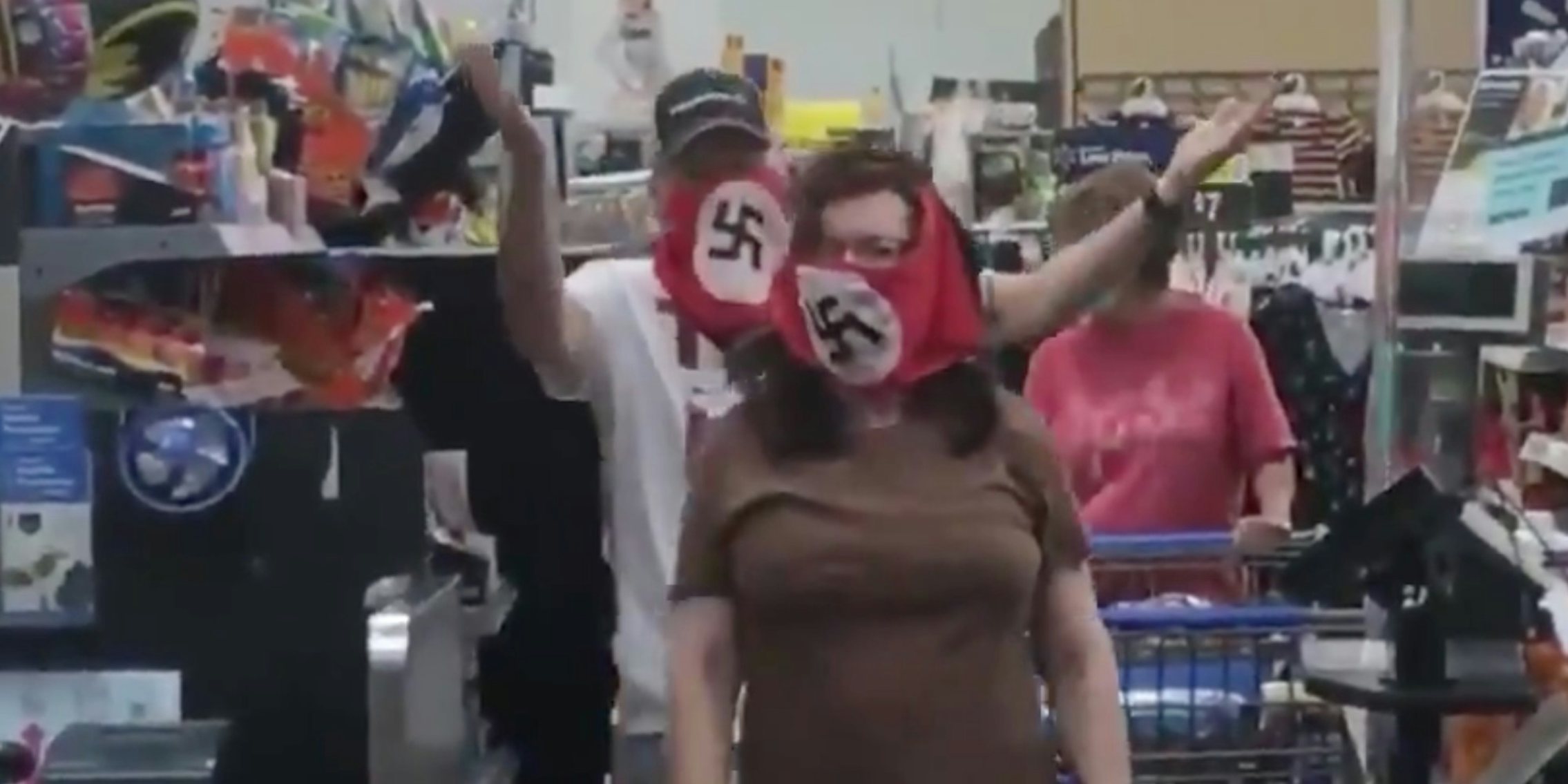 Two Trump supporters in Walmart wearing Nazi masks