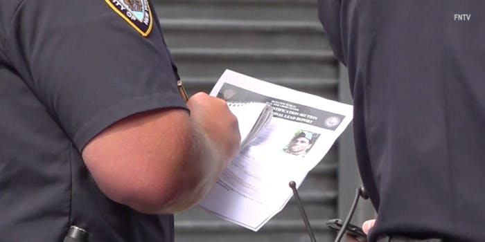 A document being held by an NYPD officer