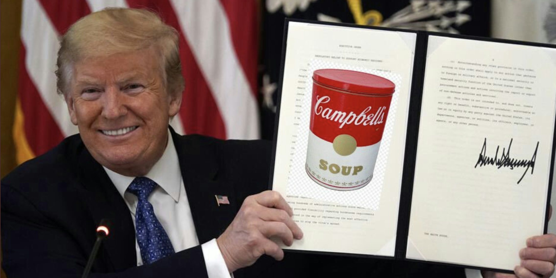 Trump holding an executive older folder with a picture of Campbells soup on it