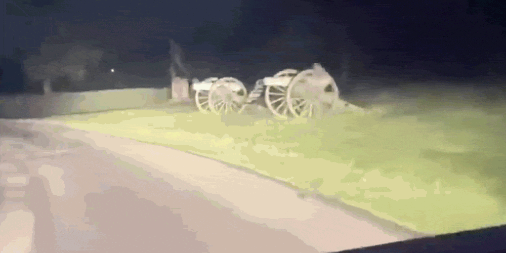 cannons distorted through water on windshield of car become gettysburg "ghosts"