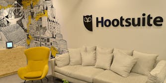 An office with the Hootsuite logo on the wall
