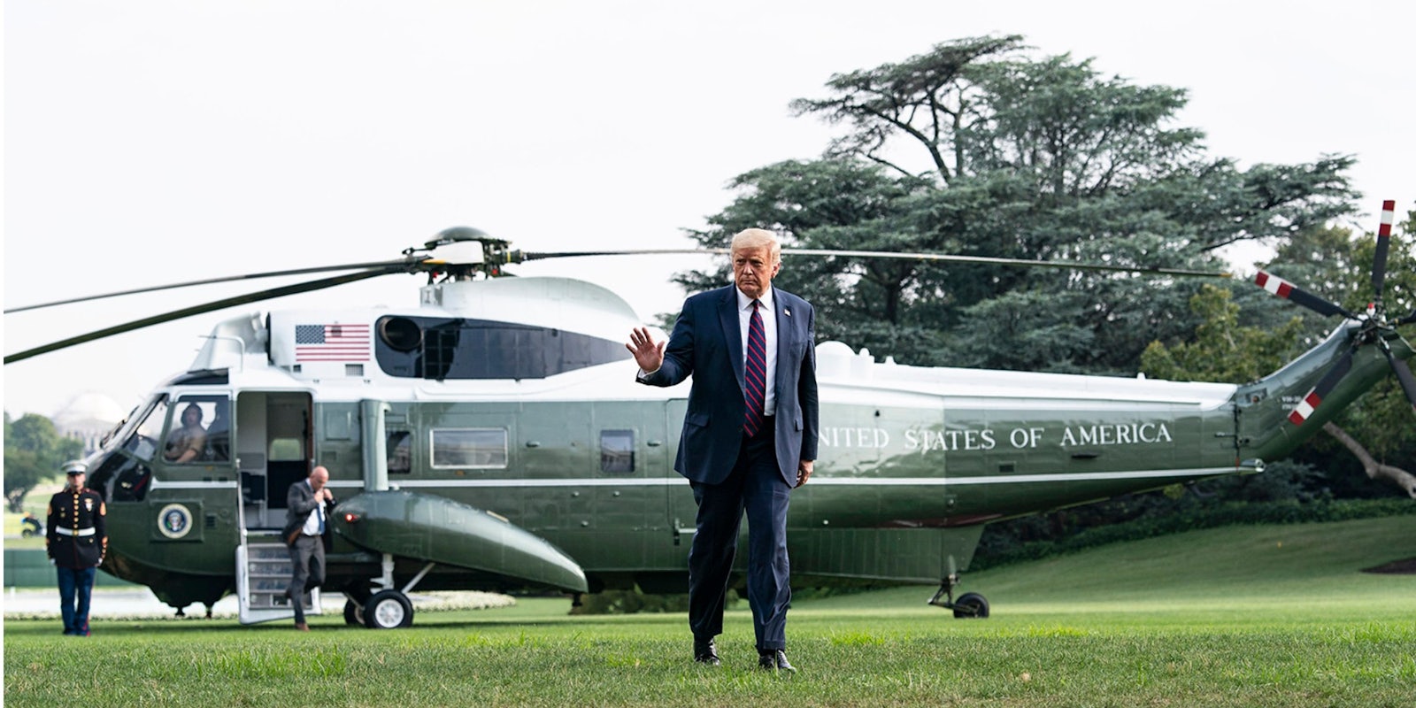 Donald Trump walking away from a helicopter