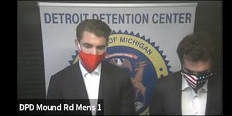 A photo of jack burkman and jacob wohl at arraignment