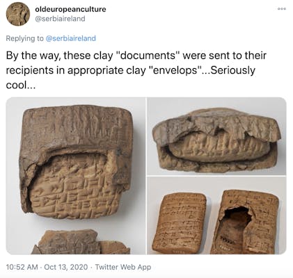 "By the way, these clay "documents" were sent to their recipients in appropriate clay "envelops"...Seriously cool..."  picture of the tablets with their clay wrappers half cracked off to show the tablet inside