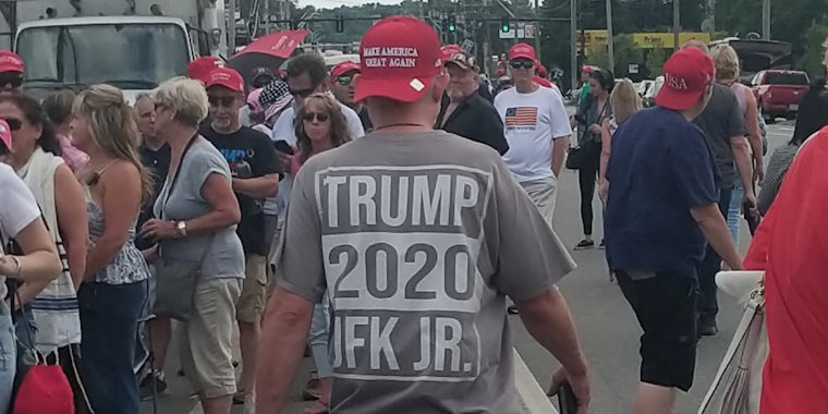 A man wearing a Trump/JFK Jr. shirt