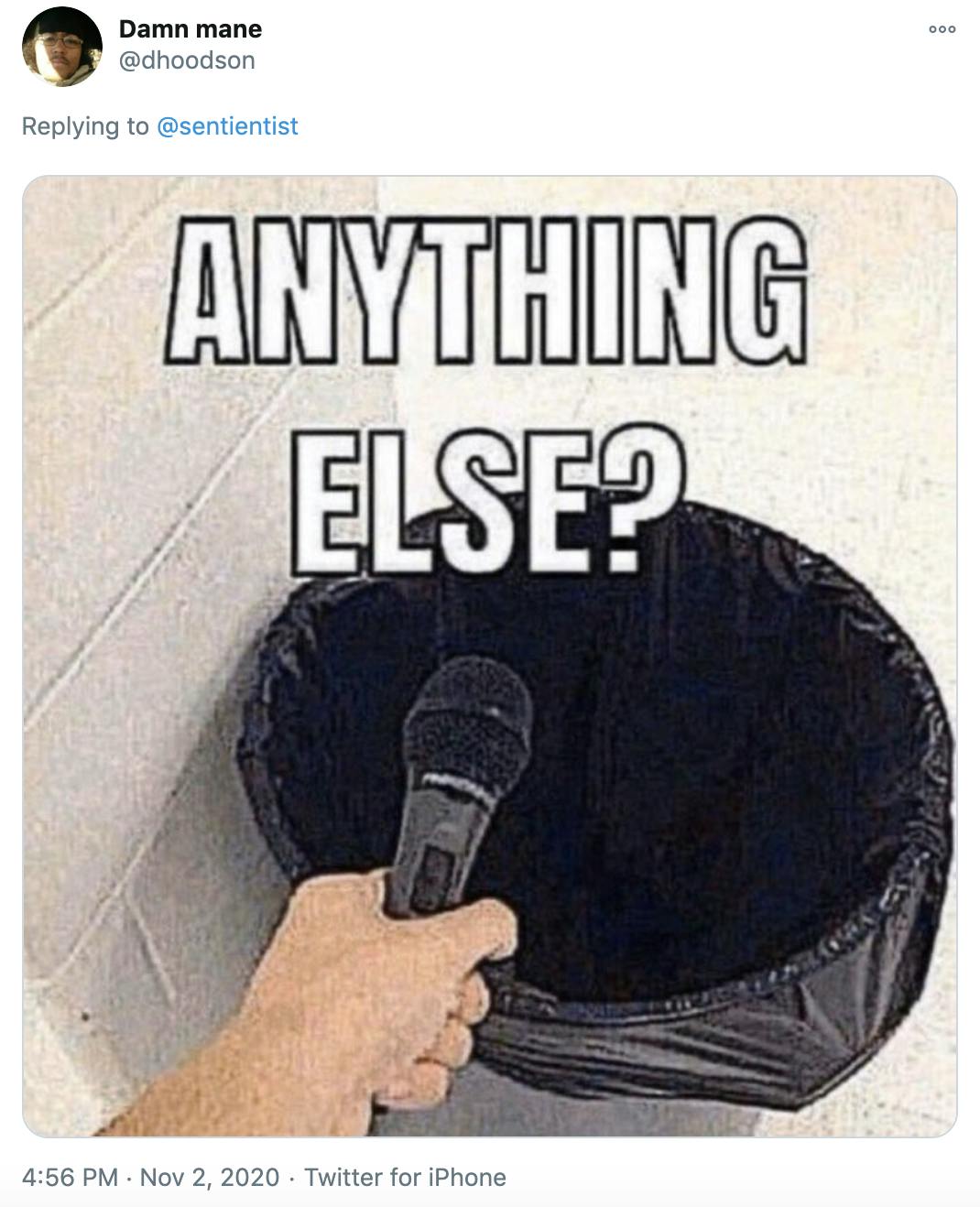 gif of a white person's hand holding a microphone out over a bin with the text 'anything else?'