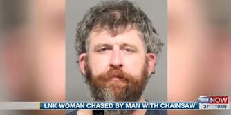man chases woman with chainsaw because she was black
