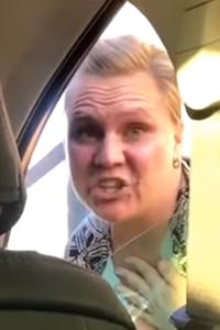 woman leaning into car window