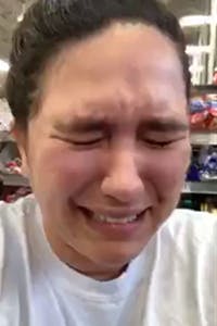 woman pretends to cry in grocery store