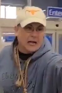 man in longhorns hat and sweatsuit screams at walmart employees