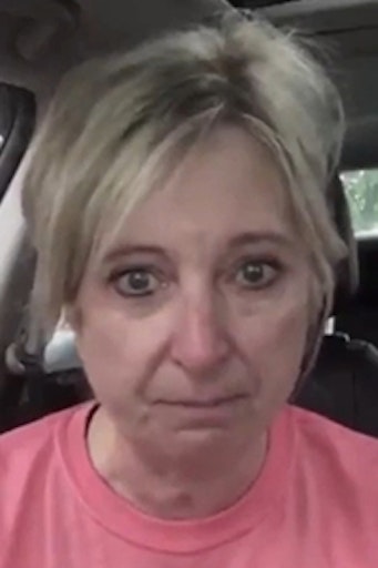 woman crying in car
