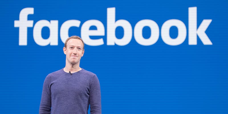 A picture of Mark Zuckerberg standing in front of the Facebook logo. A new study says Facebook is struggling to limit misinformation about the Georgia runoff Senate election.
