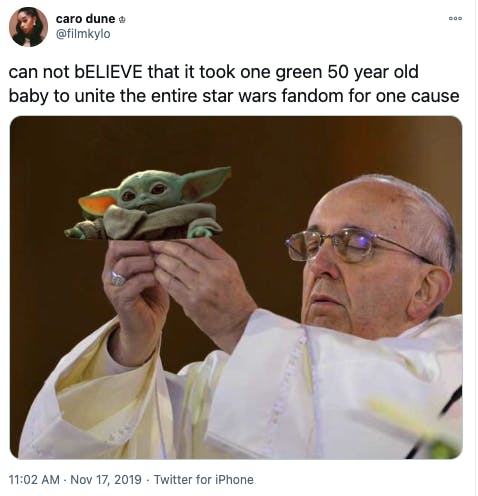 A tweet showing the Pope holding up baby yoda with the text, 'can not bELIEVE that it took one green 50 year old baby to unite the entire star wars fandom for one cause.'