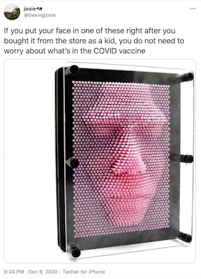 "If you put your face in one of these right after you bought it from the store as a kid, you do not need to worry about what’s in the COVID vaccine" picture of one of those puzzle toys that lets you make 3D images by pushing the nails in and out, it's pink and currently showing a face