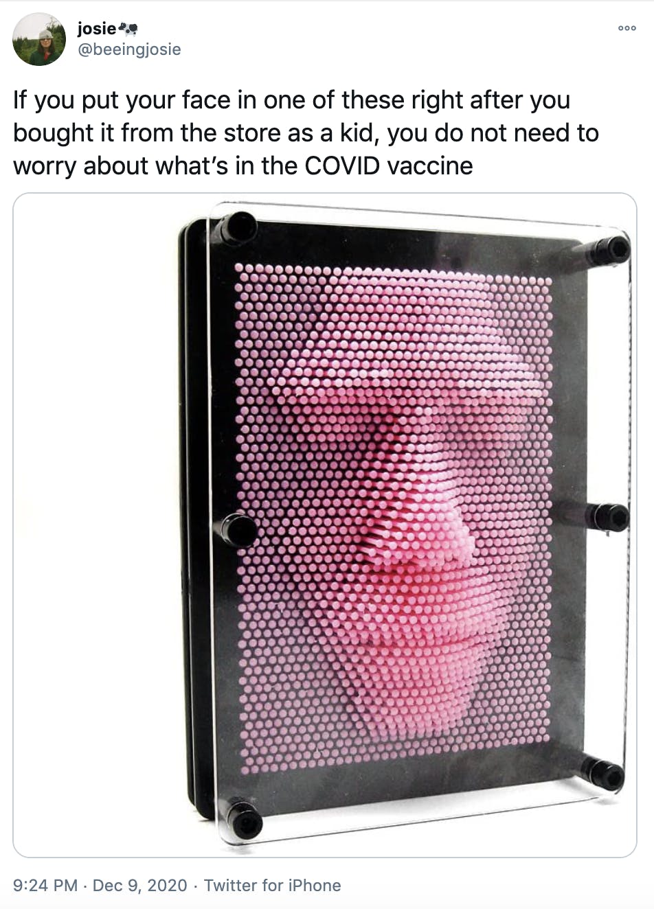 'If you put your face in one of these right after you bought it from the store as a kid, you do not need to worry about what’s in the COVID vaccine' picture of one of those puzzle toys that lets you make 3D images by pushing the nails in and out, it's pink and currently showing a face