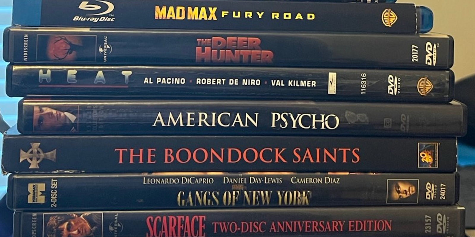 stack of movie dvds and blu-rays