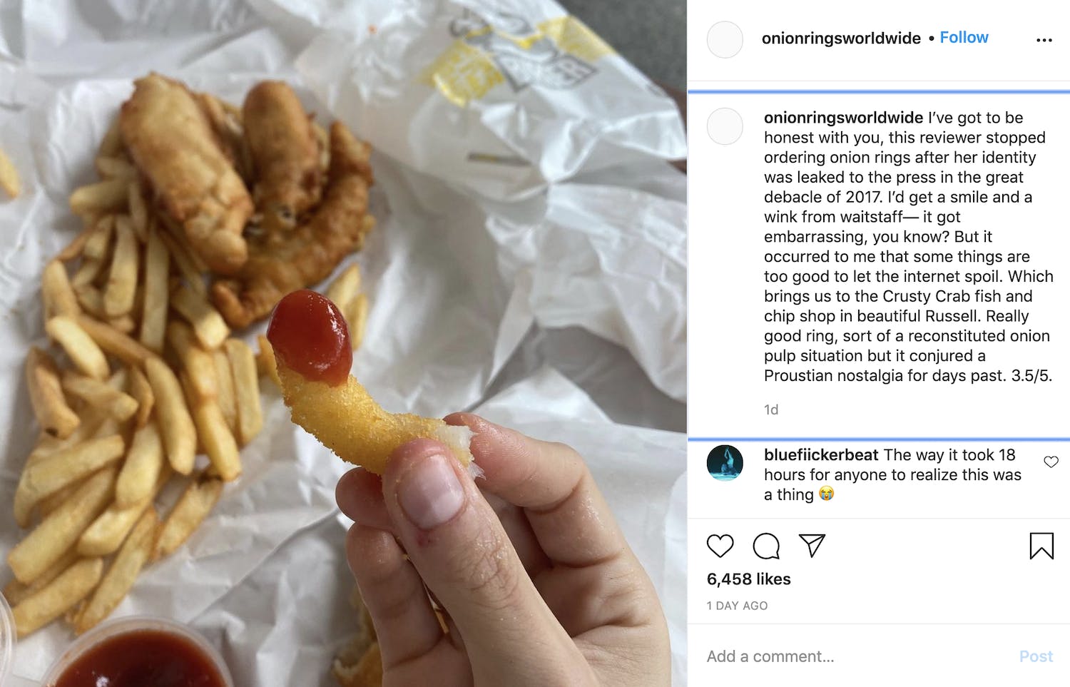 Picture of fish and chips with a hand holding part of an onion ring that's been dipped in ketchup in front of it with the caption 'I’ve got to be honest with you, this reviewer stopped ordering onion rings after her identity was leaked to the press in the great debacle of 2017. I’d get a smile and a wink from waitstaff— it got embarrassing, you know? But it occurred to me that some things are too good to let the internet spoil. Which brings us to the Crusty Crab fish and chip shop in beautiful Russell. Really good ring, sort of a reconstituted onion pulp situation but it conjured a Proustian nostalgia for days past. 3.5/5.'