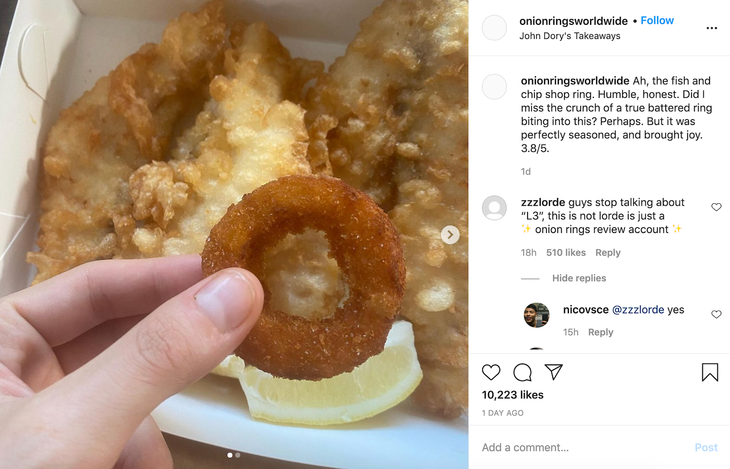 Picture of a crumbed onion ring held between forefinger and thumb in front of several pieces of battered fish and a wedge of lemon captioned with 'Ah, the fish and chip shop ring. Humble, honest. Did I miss the crunch of a true battered ring biting into this? Perhaps. But it was perfectly seasoned, and brought joy. 3.8/5.'