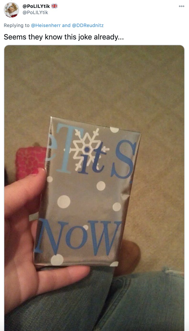 'Seems they know this joke already...' a present wrapped in let it snow paper, arranged so tits now is on the front