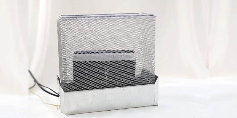 A shield designed to block EMF signals from routers