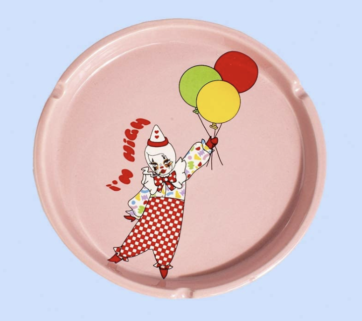 Valfre's ceramic pink ashtray with a clown and the words "i'm high" painted on it.